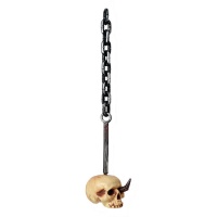Pendente de caveira presa numa corrente