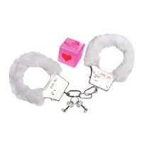 Conjunto erótico de dados rosa com algemas de metal com pelo branco