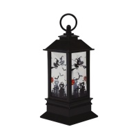 Lanterna preta de Halloween com vela brilhante
