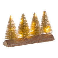 Árvores de Natal com luz na base do tronco