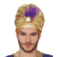 Turbante dourado com pena