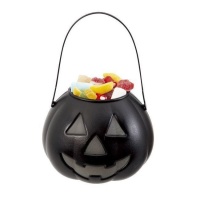 Balde de doces de abóbora fluorescente
