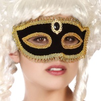 Máscara veneziana decorada a preto e dourado