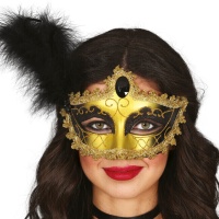 Máscara veneziana gradiente preta e dourada com pena preta.