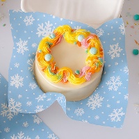 Papel anti-gordura com flocos de neve 25 x 25 cm - 50 unidades